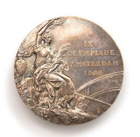 Front: Amsterdam 1928 silver medal, Nike seated holding laurel wreath