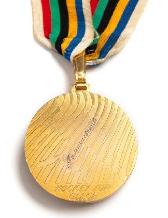 Back: Grenoble 1968 gold medal, ice hockey with corresponding design