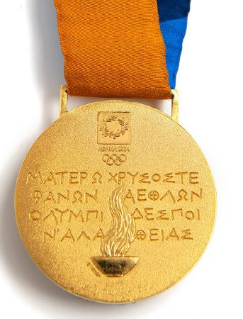 Back: Athens gold medal, Emblem over Greek writing and Olympic cauldron